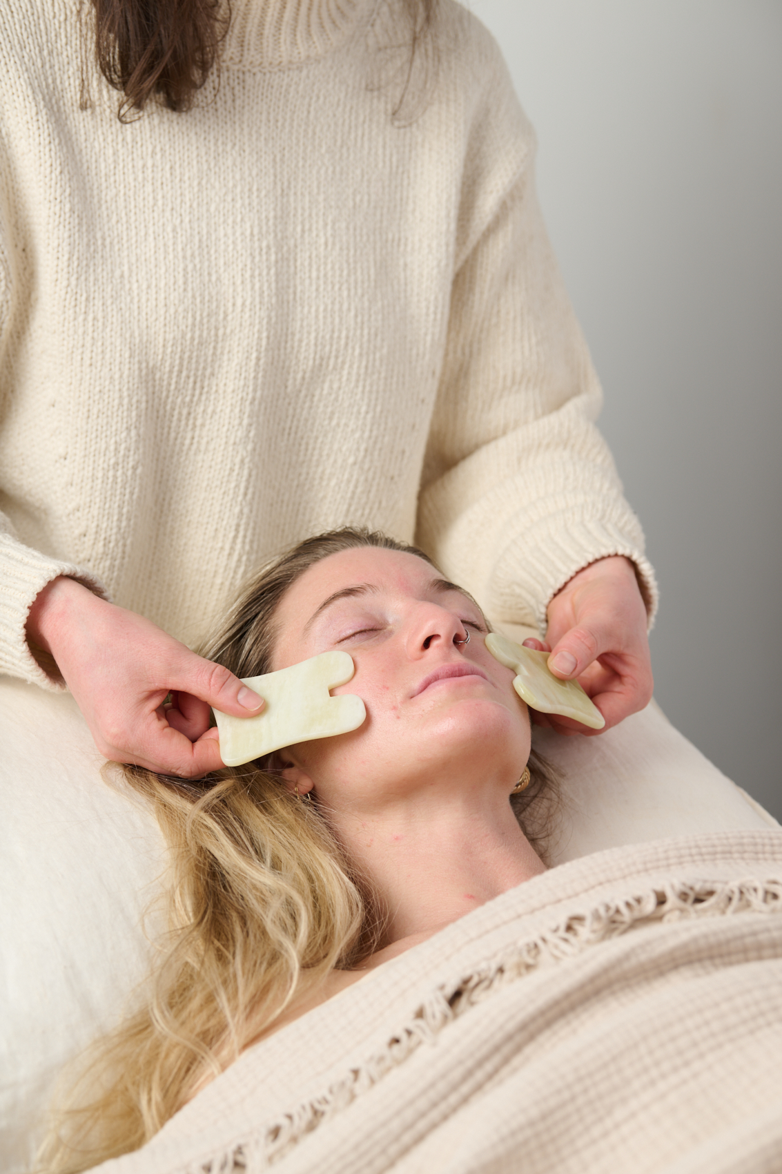 Gua sha treatment being performed at Point Acupuncture in Portland, Maine